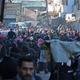 People gather to be evacuated from al-Sukkari rebel-held sector of eastern Aleppo. (Reuters/Abdalrhman Ismail)
